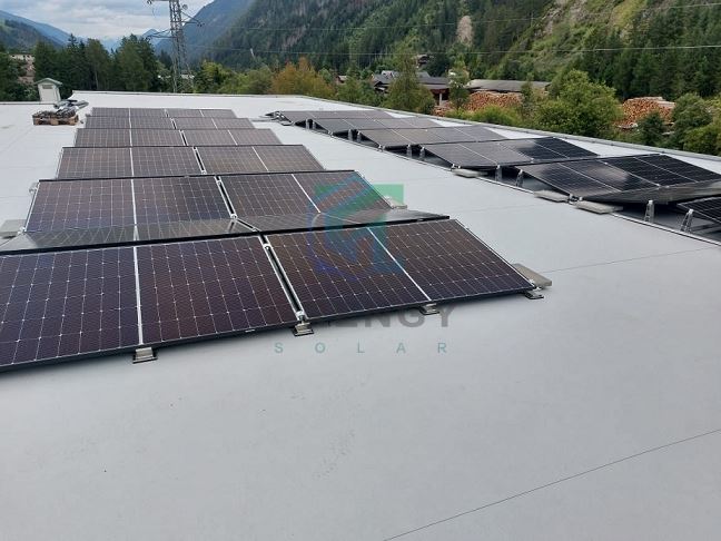 Sistema de montaje con balasto para techo plano